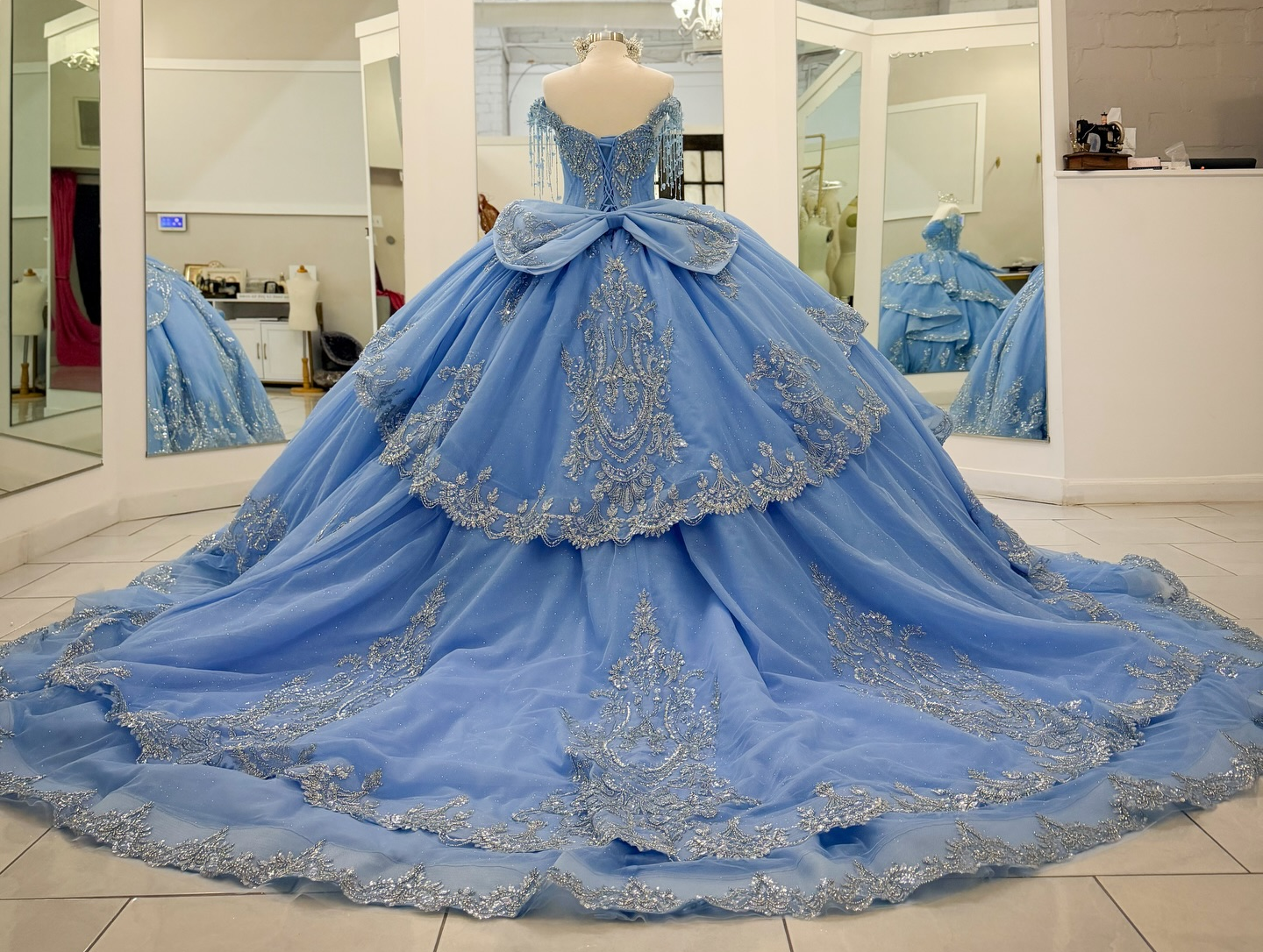 Ball Gown Princess Lace Crystal Beaded Blue Quinceanera Dresses with Ruffled HE1571